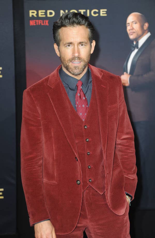 Ryan in a corduroy suit at a red carpet event