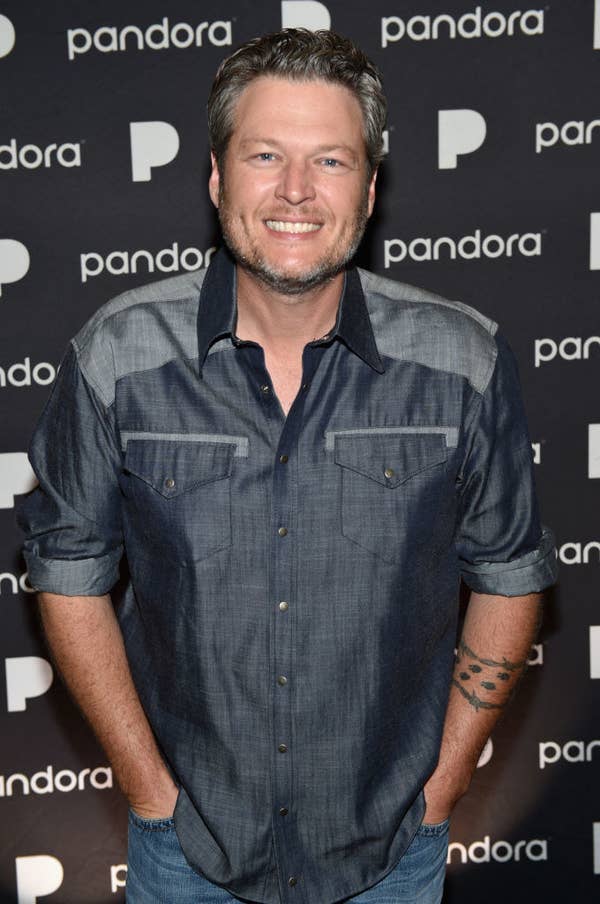 Blake smiles on a red carpet at a pandora party