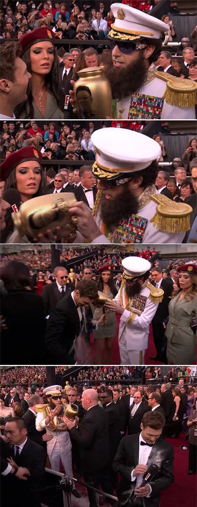 Sasha holding an urn, then pretending to look at the bottom of the urn, which causes the ashes to pour out on Ryan