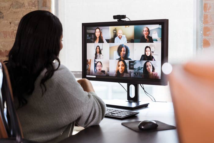 Woman talking with coworkers on Zoom