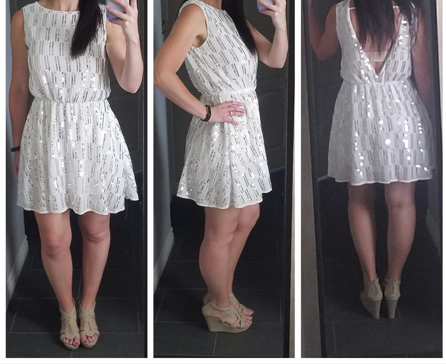 A reviewer in the white mini dress from the front, side, and back