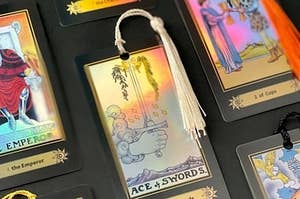 the tarot card bookmarks with tassels on the end