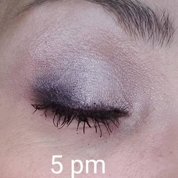 the same reviewer with the eyeshadow still on labeled 