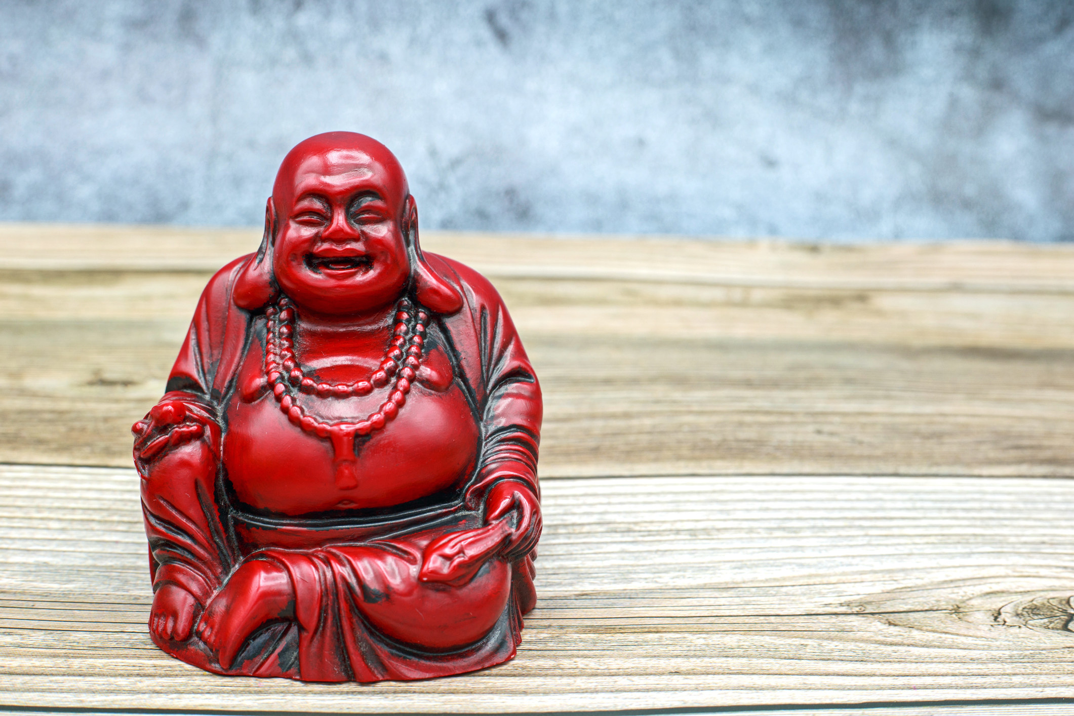 depiction of chubby smiling buddha