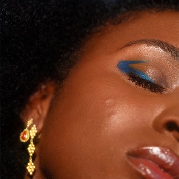 a model wearing the eyeliner in blue