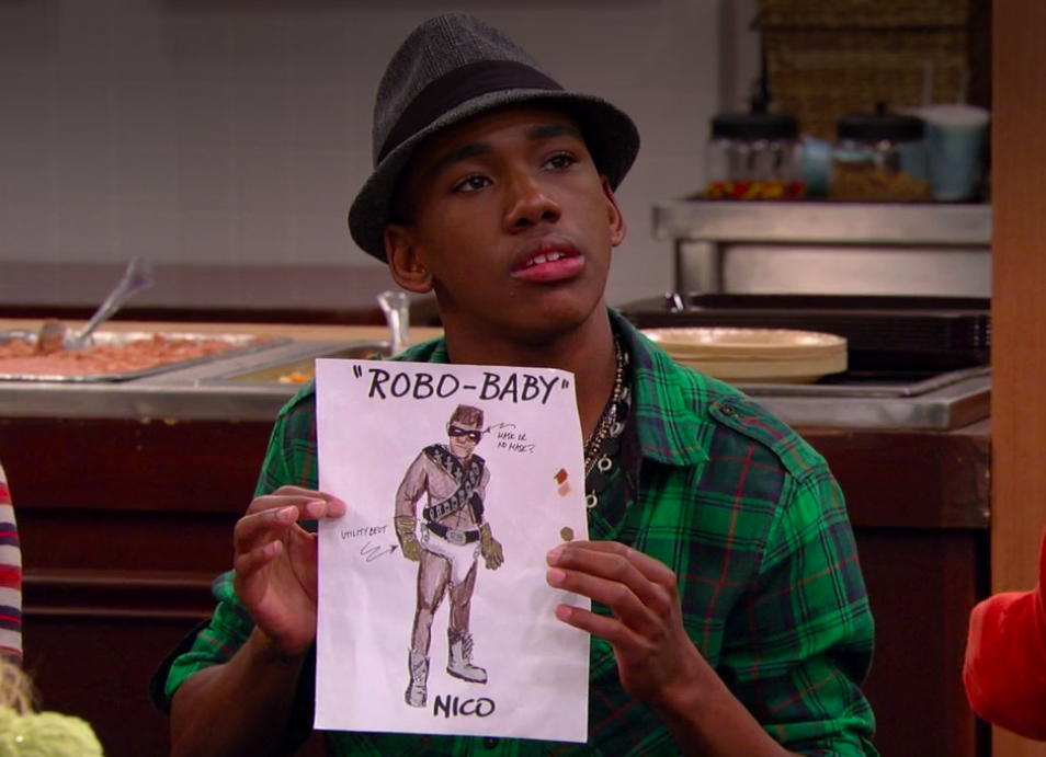 Brandon with a fedora on holding up a drawing on &quot;Sonny With a Chance&quot;