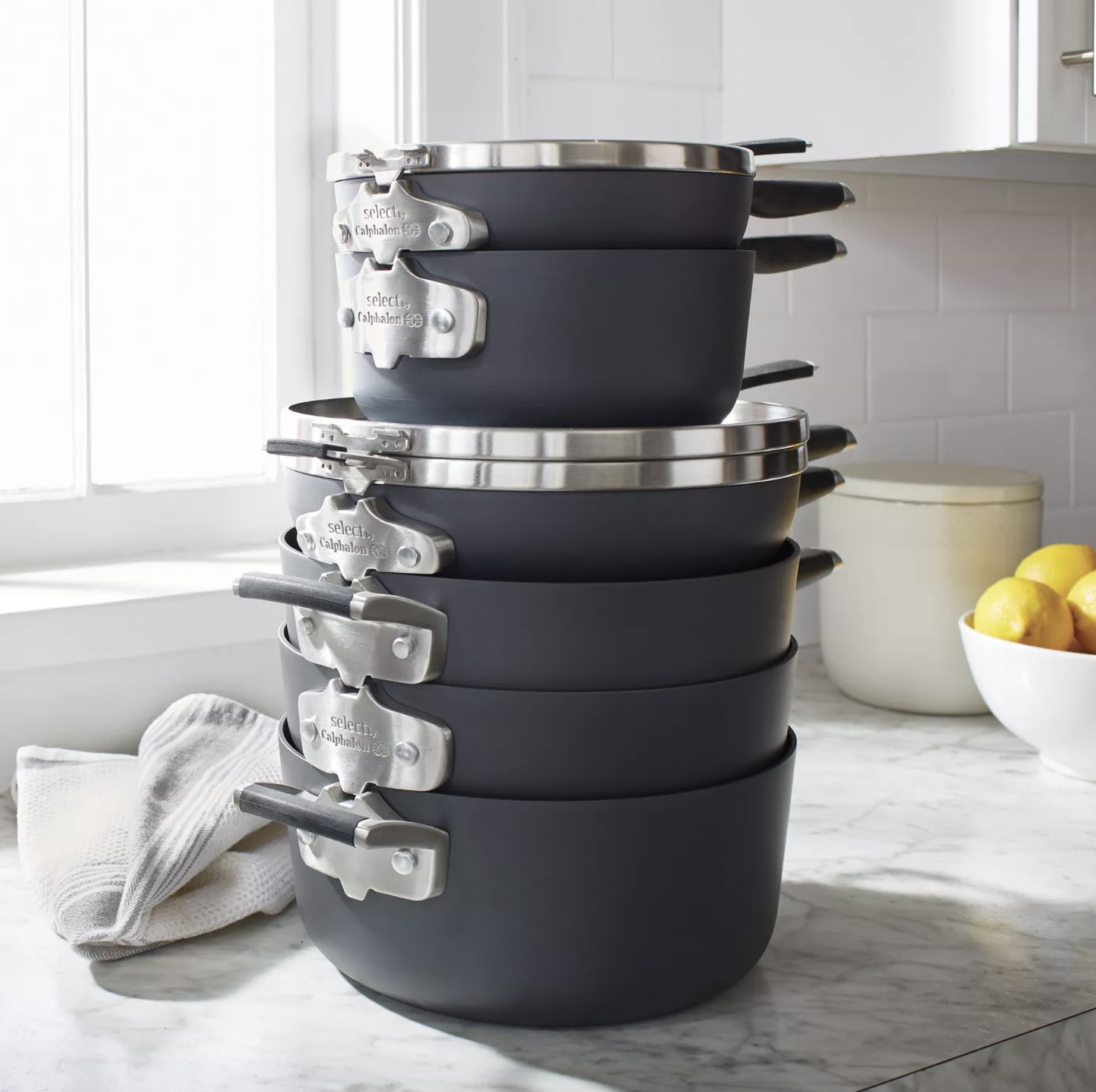 The black matte cookware stacked
