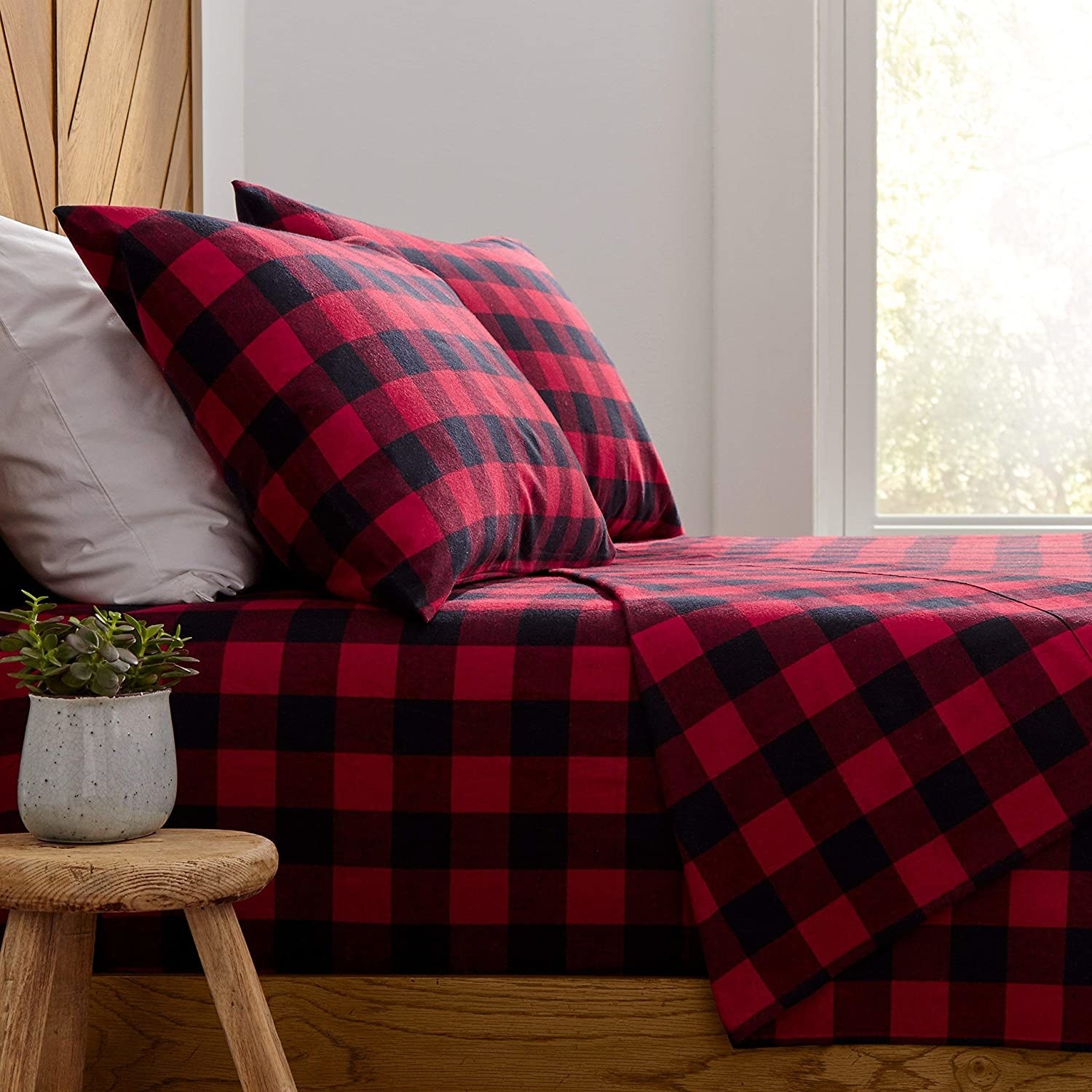 a set of cozy flannel bed sheets on a neatly made up bed
