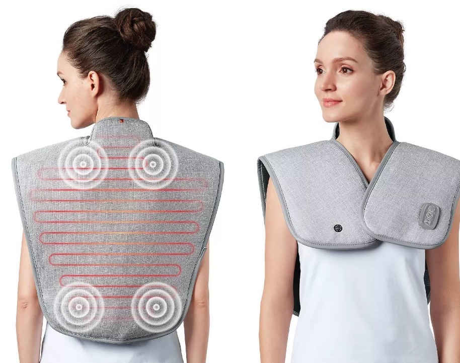 A model wearing a grey wrap neck heated neck massager