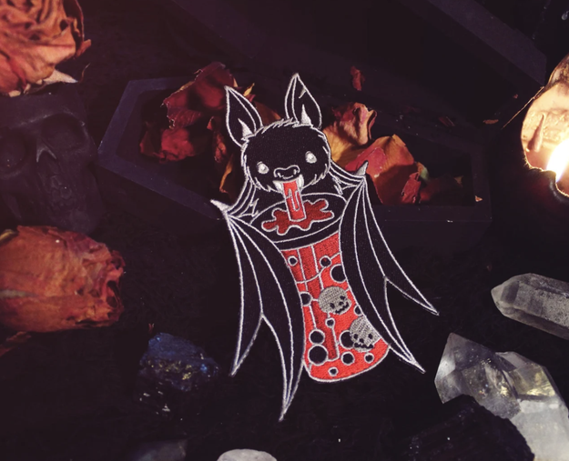 Bat drinking red bubble tea