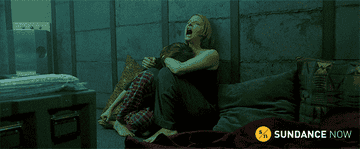 Meg screaming in the panic room as she holds Sarah
