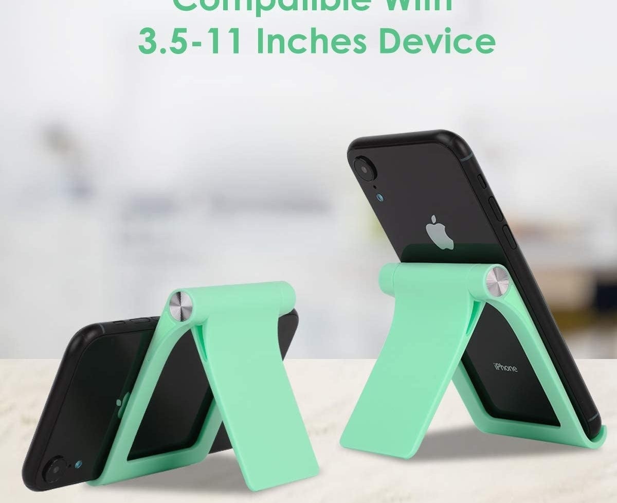 Two phones on two phone stands