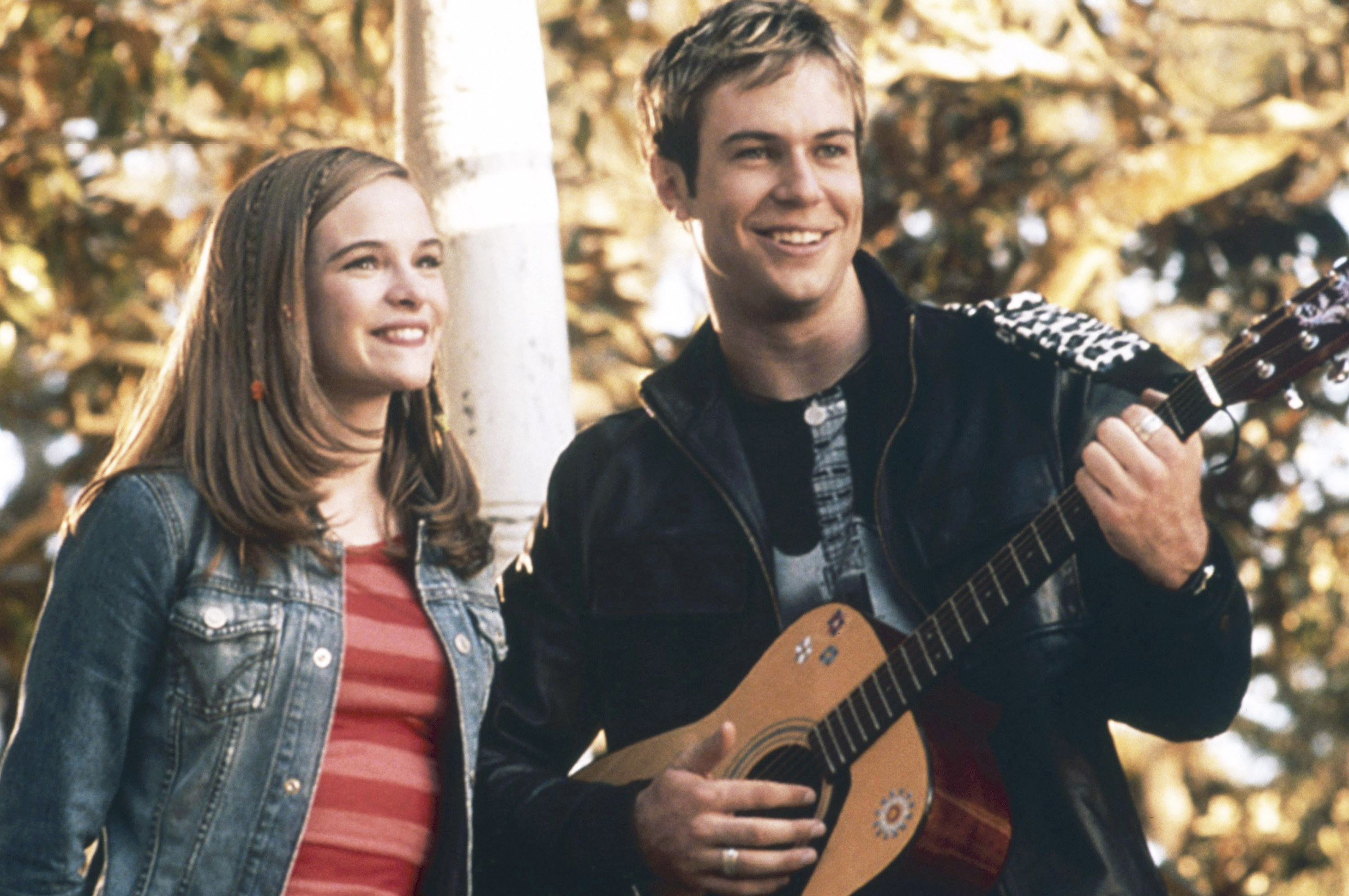 Danielle Panabaker smiling next to Taran Killem in &quot;Stuck in the Suburbs&quot;