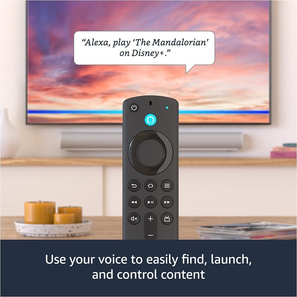 the fire tv stick remote with text that reads &quot;use your voice to easily find, launch, and control content&quot;
