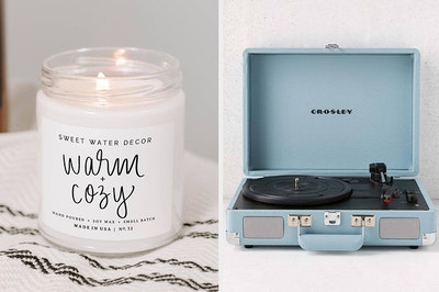 a warm + cozy candle and a blue vinyl record player