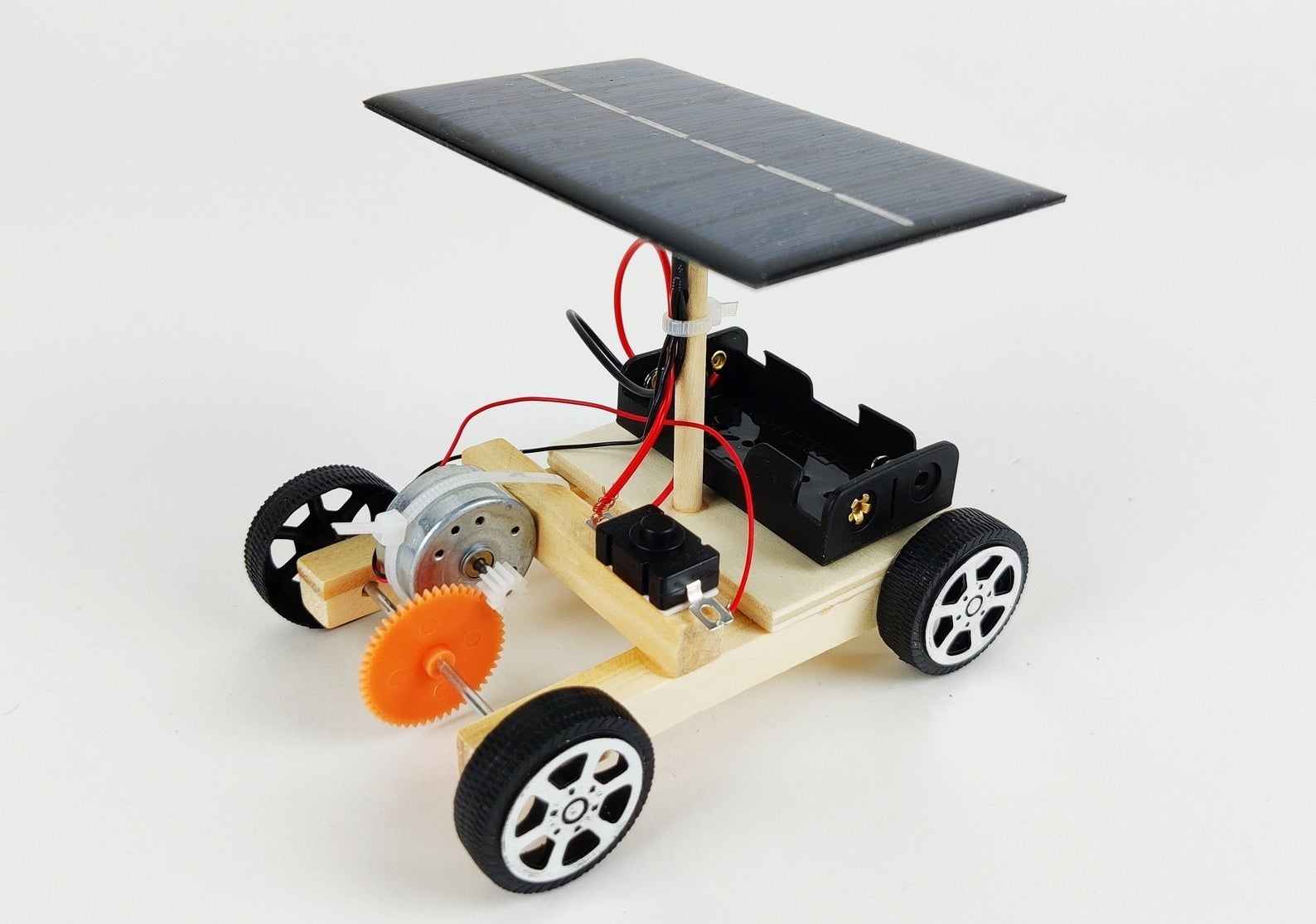 The solar car fashioned out of wood and other parts