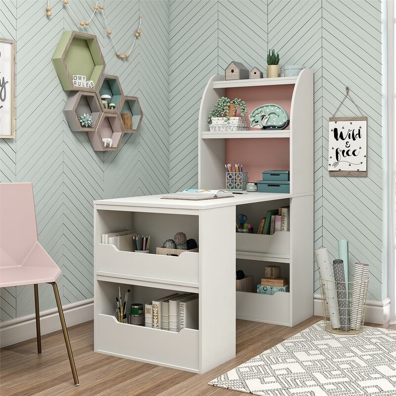 the white desk with shelving and a hutch