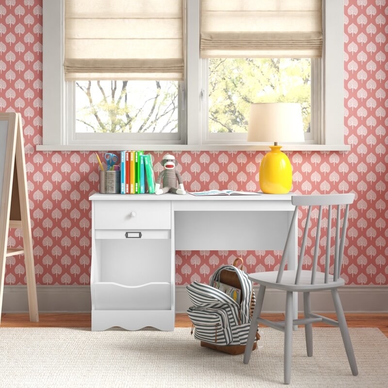 the white desk in a brightly decorated room