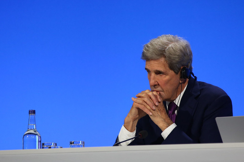 John Kerry at a podium at COP26