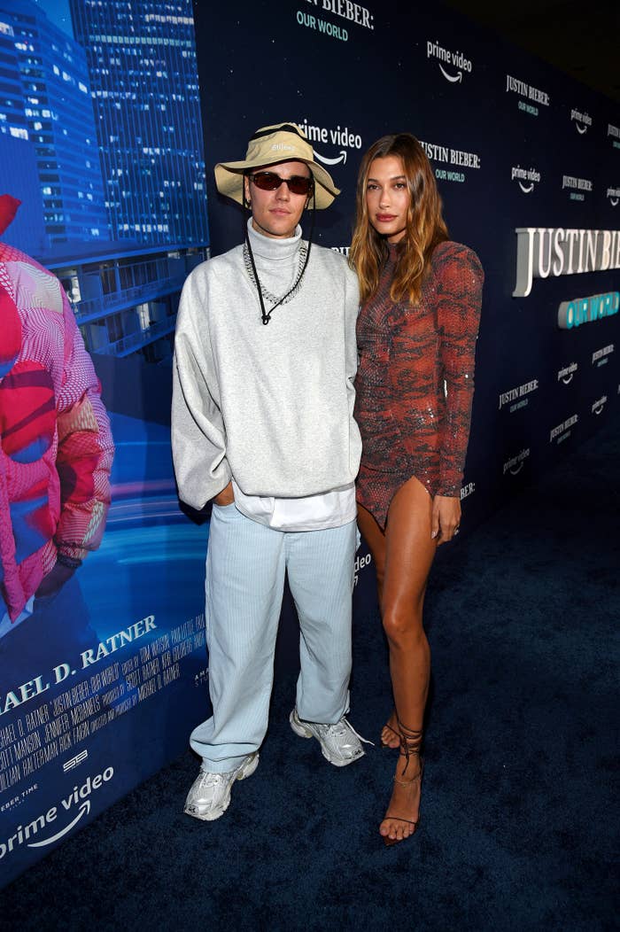 Justin and Hailey Bieber pose for a photo at a premiere