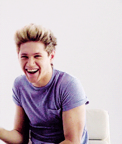 Niall blushing and laughing
