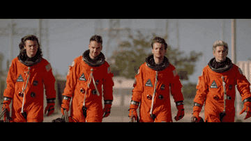 A clip from &quot;Drag Me Down&quot; music video