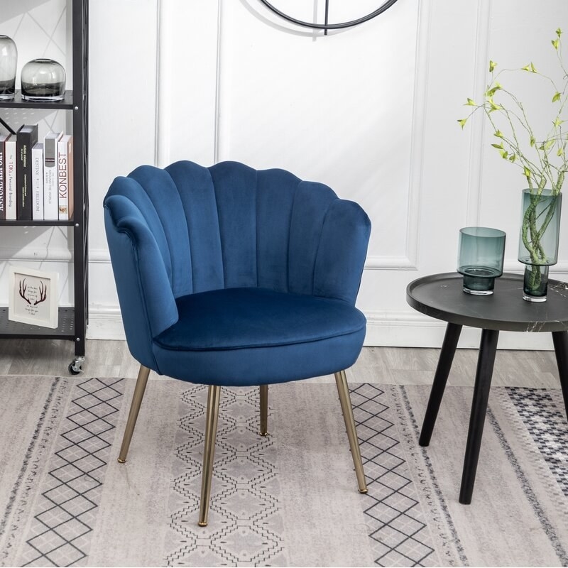 Blue velvet scalloped chair