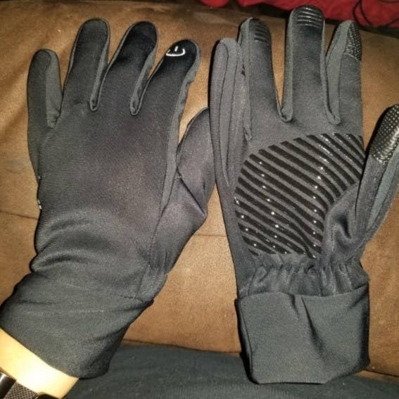 A reviewer&#x27;s image of a pair of touchscreen winter gloves
