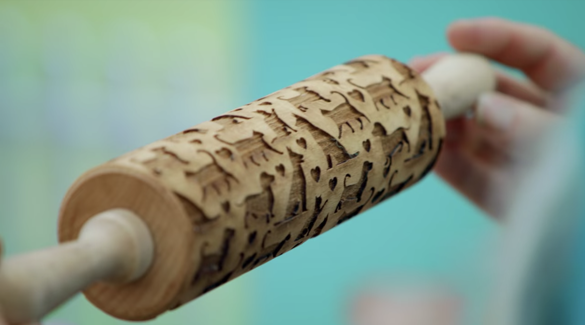 Lizzie&#x27;s rolling pin, which is embossed with a pattern of dogs