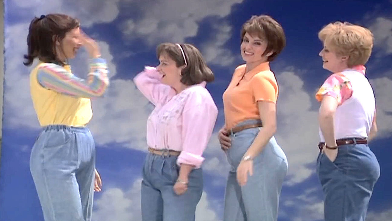 Four middle-aged women wearing &quot;mom jeans&quot;