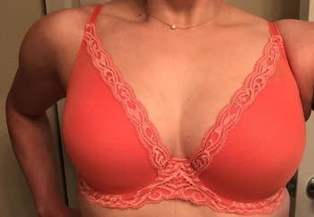 Reviewer image of them wearing the bra in orange