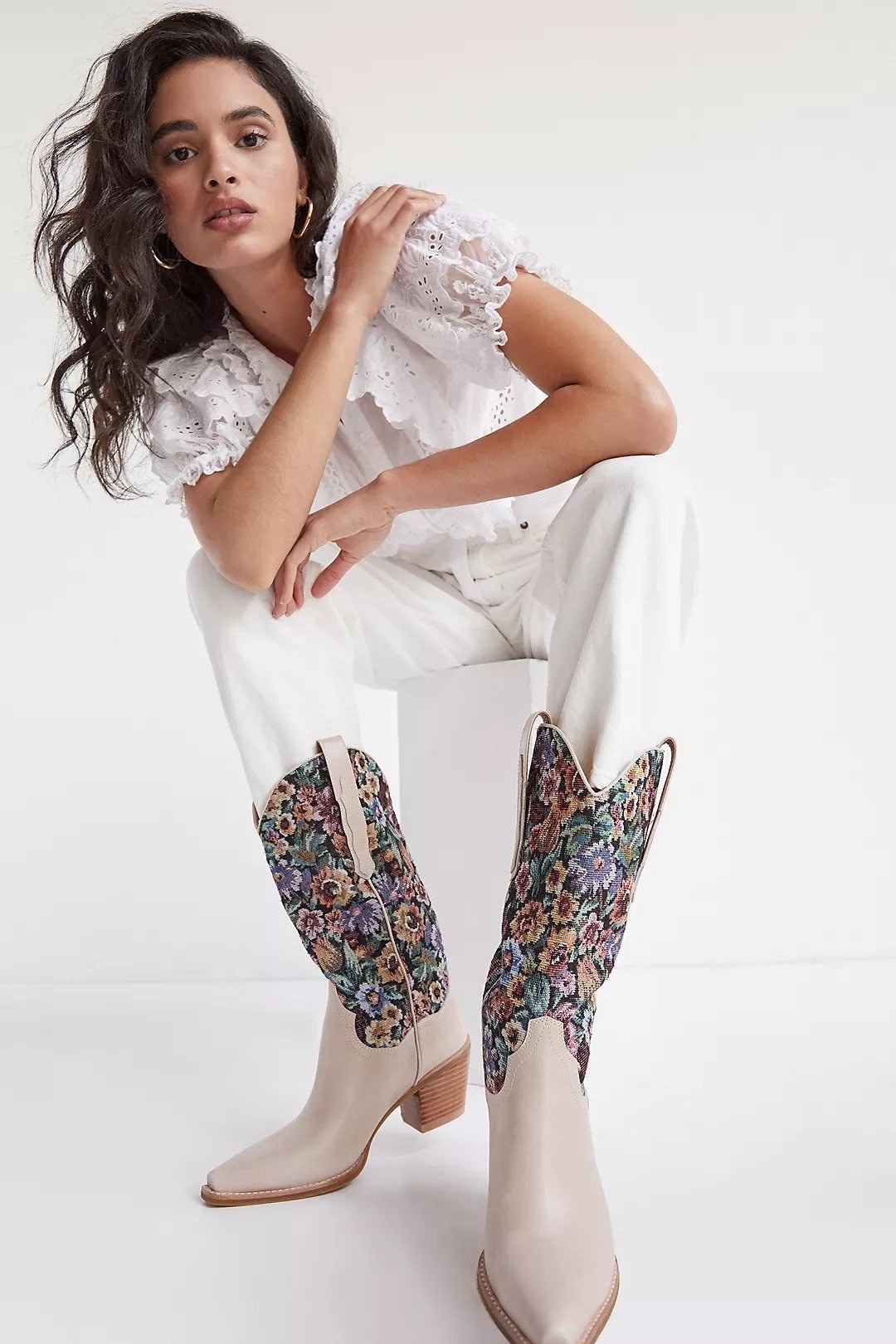 beige cowgirl boots with floral tapestry pattern and fabric up the top