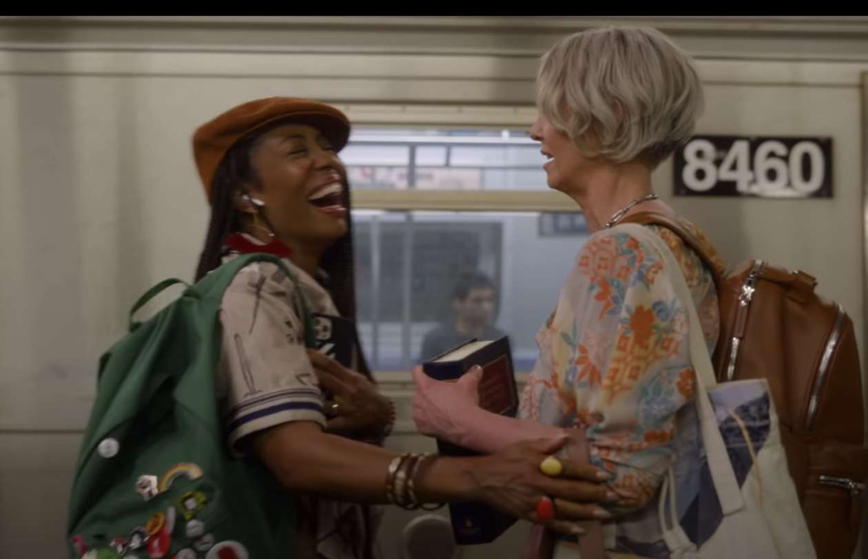 Miranda running into another woman on the subway platform