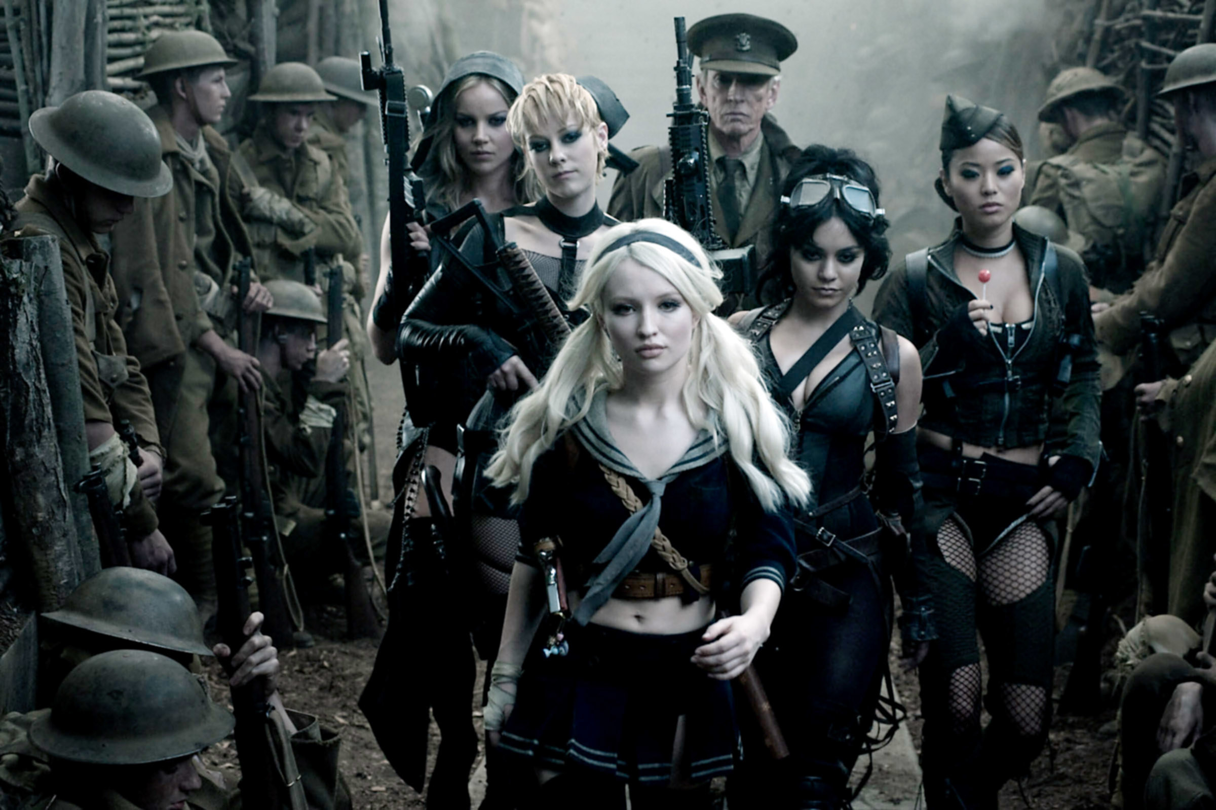 Abbie Cornish, Jena Malone, Emily Browning, Scott Glenn, Vanessa Hudgens, and Jamie Chung march down a trench