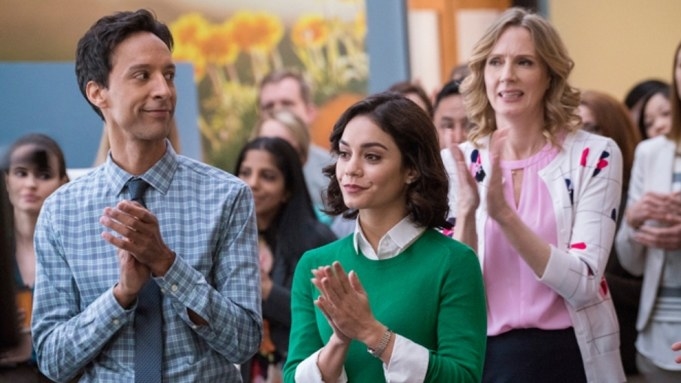 Danny Pudi and Vanessa Hudgens clap