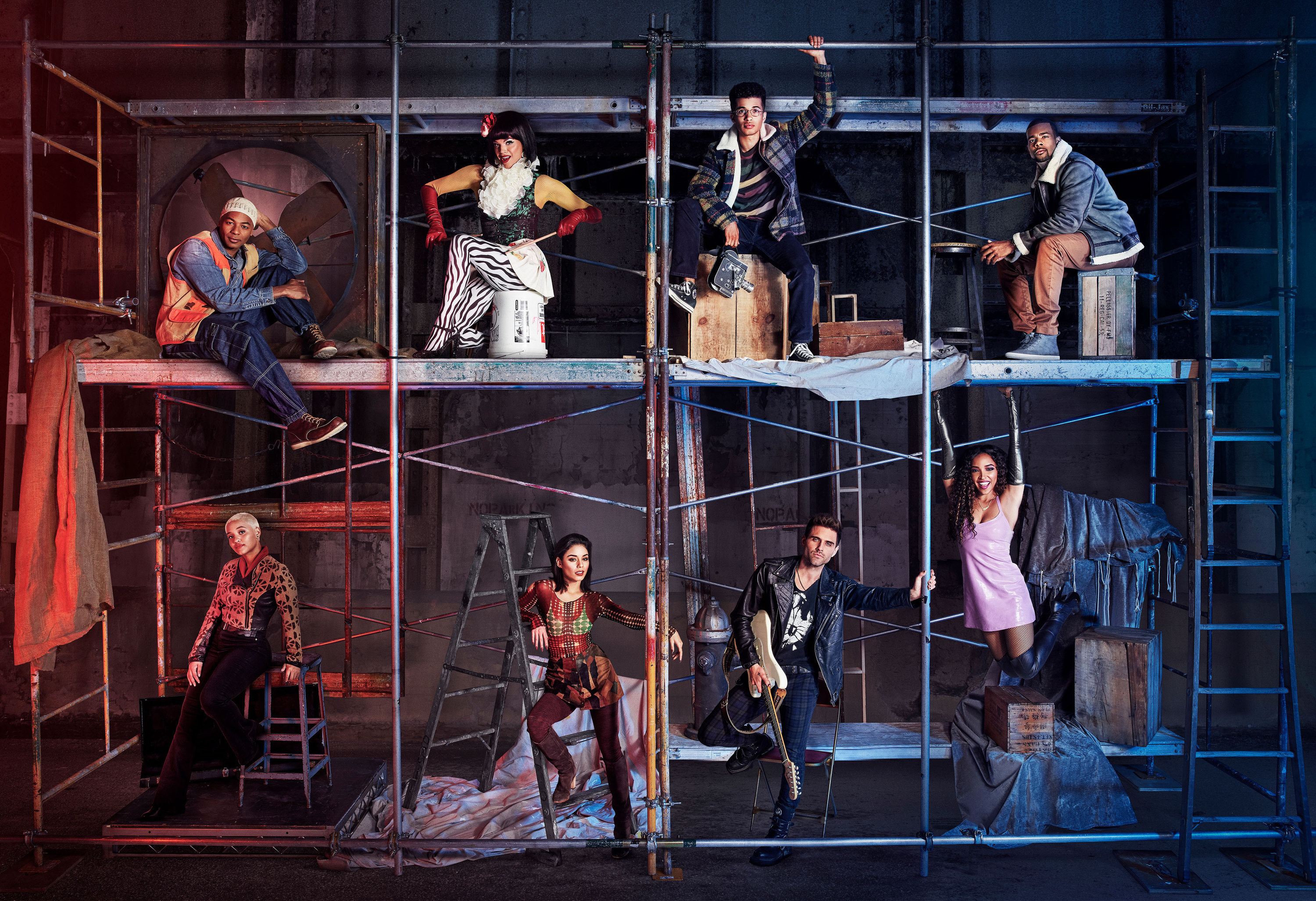 Brandon Victor Dixon, Valentina, Jordan Fisher, Mario, Kiersey Clemons, Vanessa Hudgens, Brennin Hunt, and Tinahse pose on scaffolding