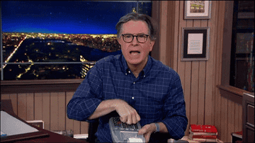 stephen colbert punching numbers on a calculator