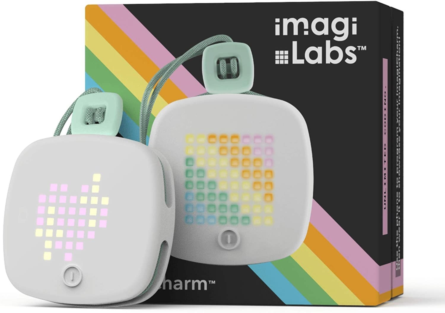 The imagiCharm device set in front of its box.