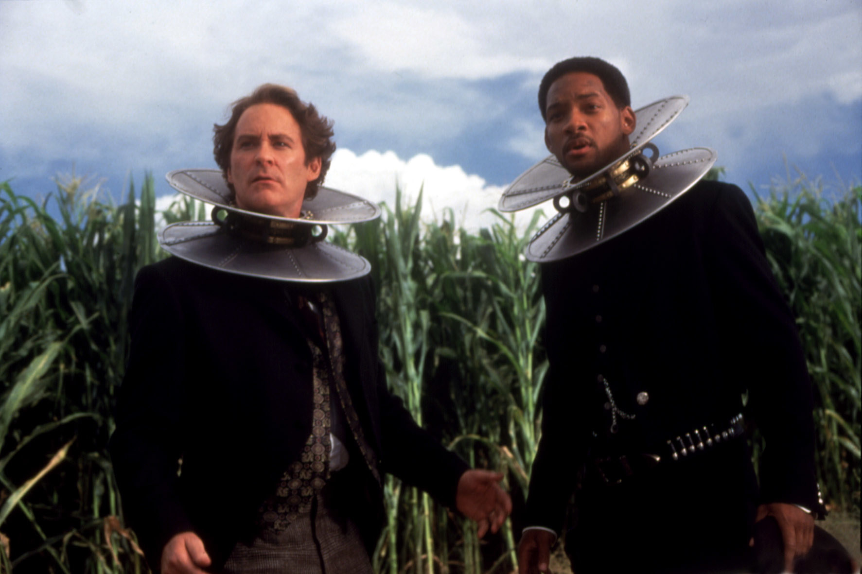 Smith and Kevin Kline wearing metal collars in a scene from Wild Wild West