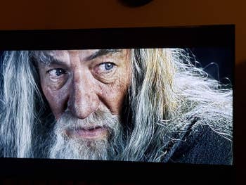 A photo of the tv with a super clear shot of Gandalf