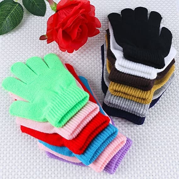 A set of 12 pairs of kids gloves available in different color options