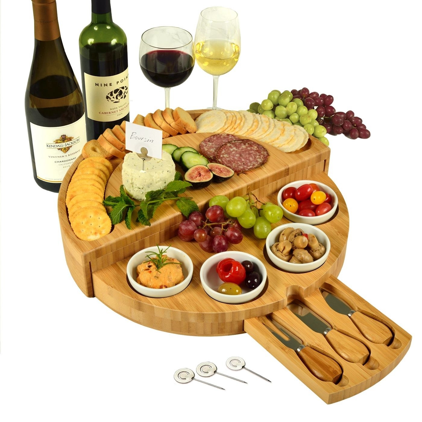 A cheese board filled with charcuterie