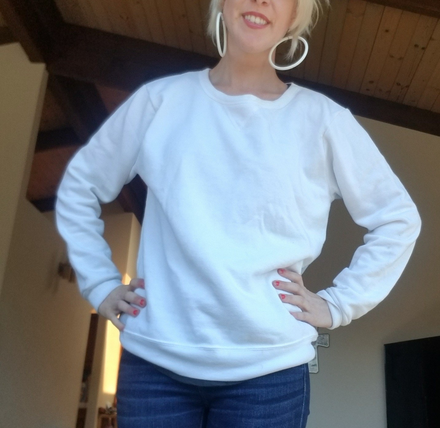 a reviewer in a white sweatshirt