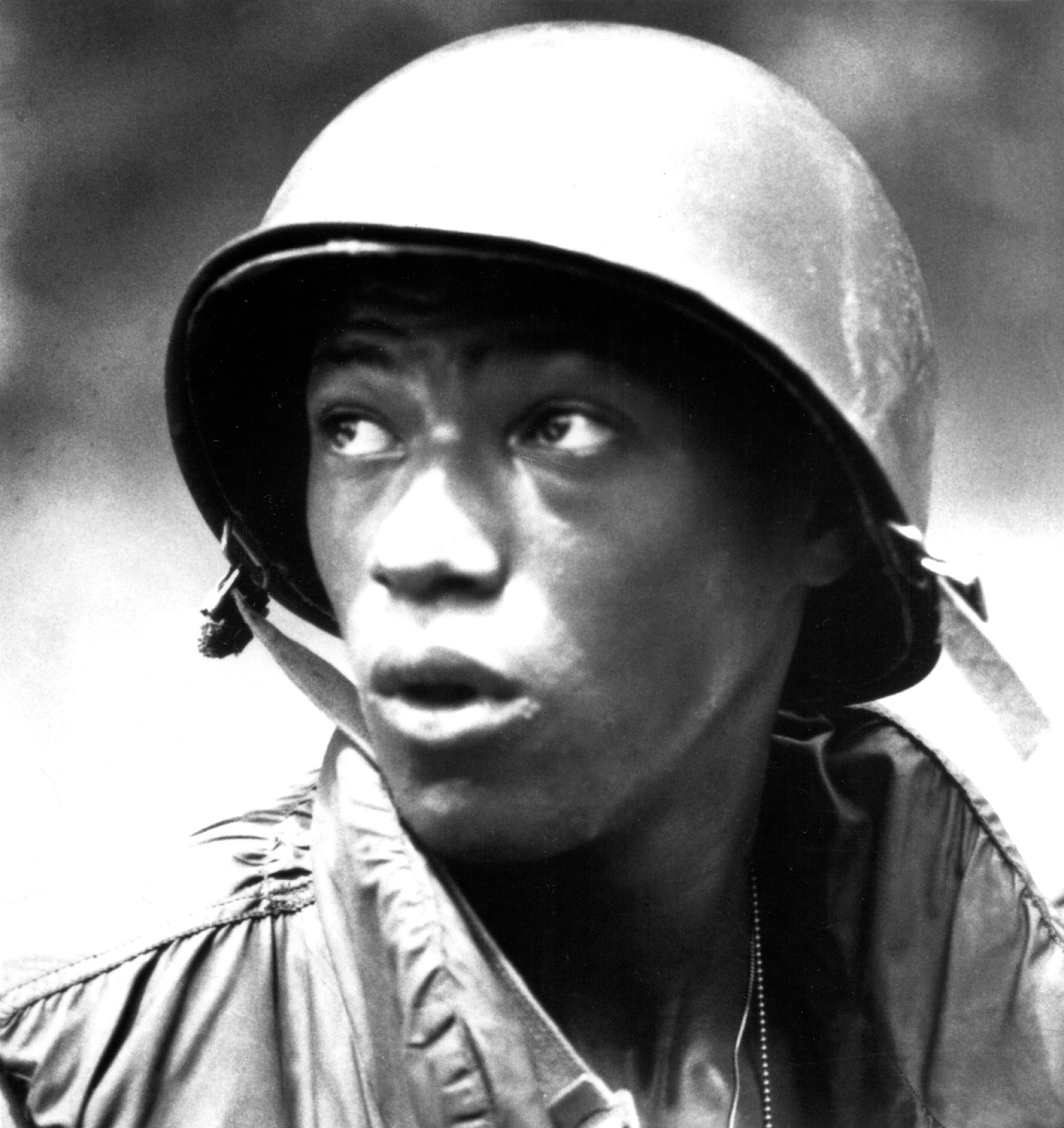 Laurence Fishburne wearing a flak helmet in Apocalypse Now