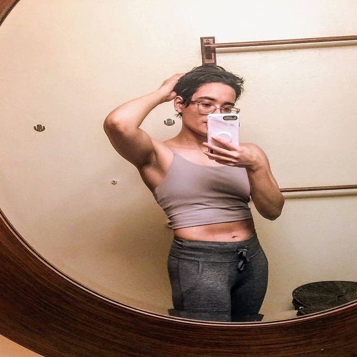 Reviewer photo of them wearing the light purple bra top