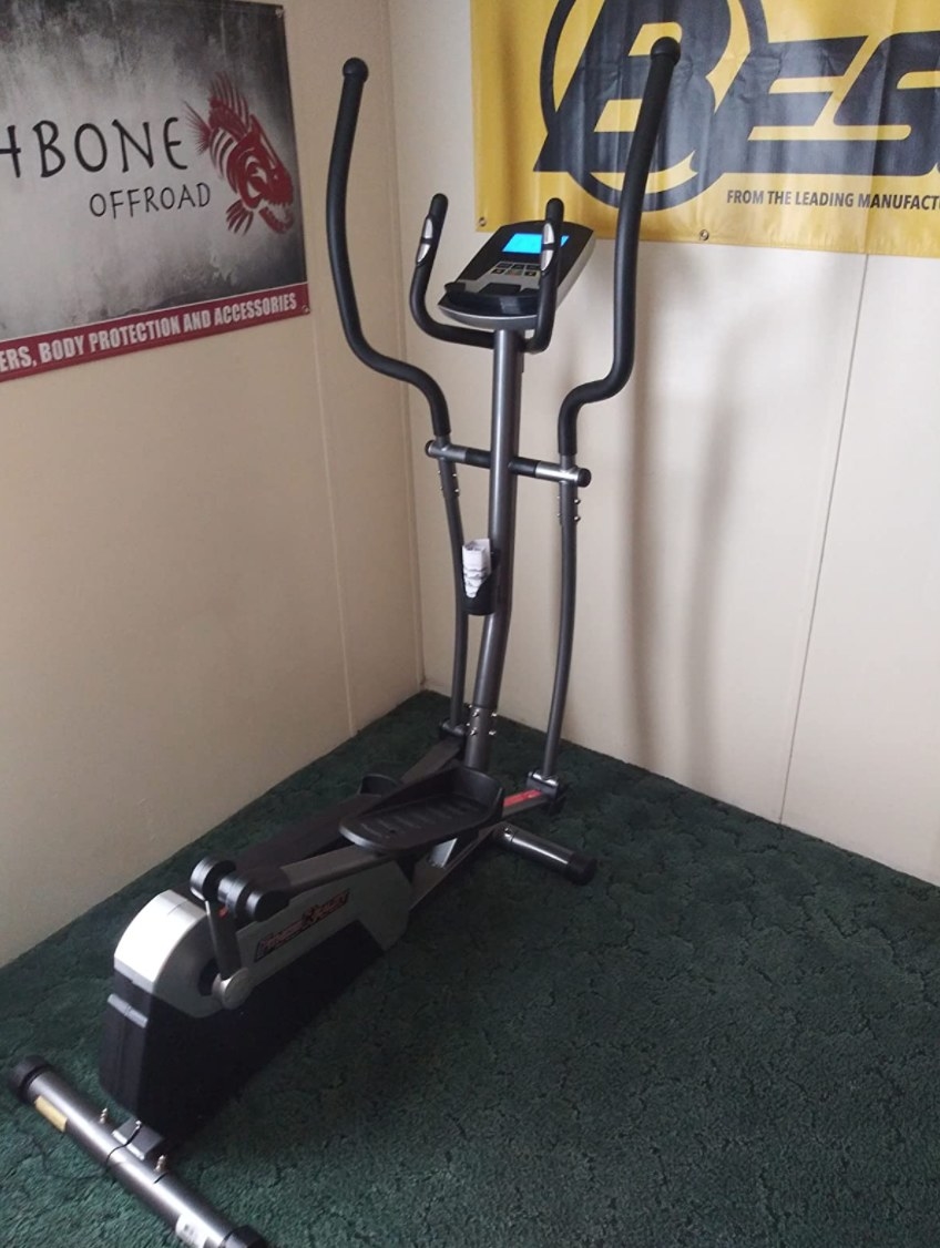 a reviewer&#x27;s black elliptical with two sets of handles and a digital screen