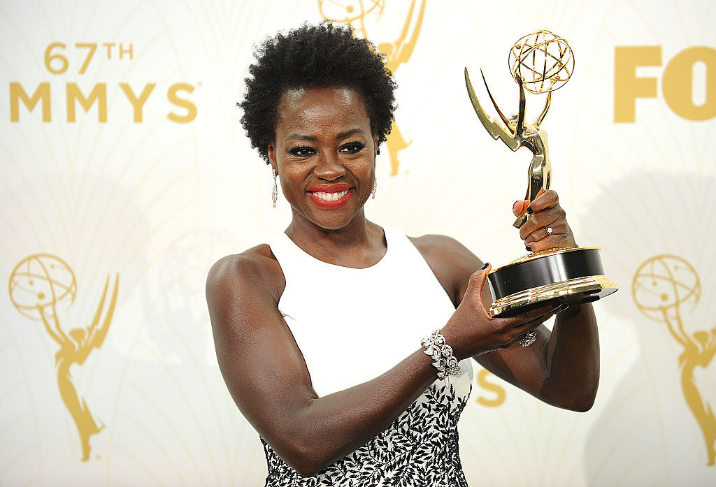 Viola proudly displaying her Emmy