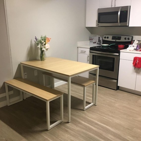 A reviewer&#x27;s image of a three-piece modern dining set