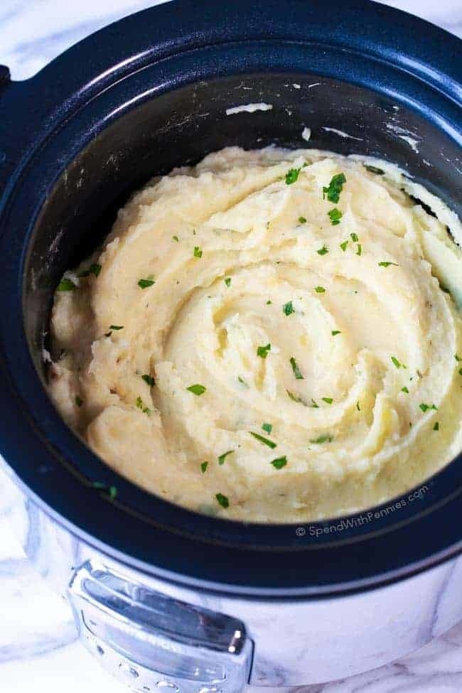 Mashed potatoes in a slow cooker, ready to serve