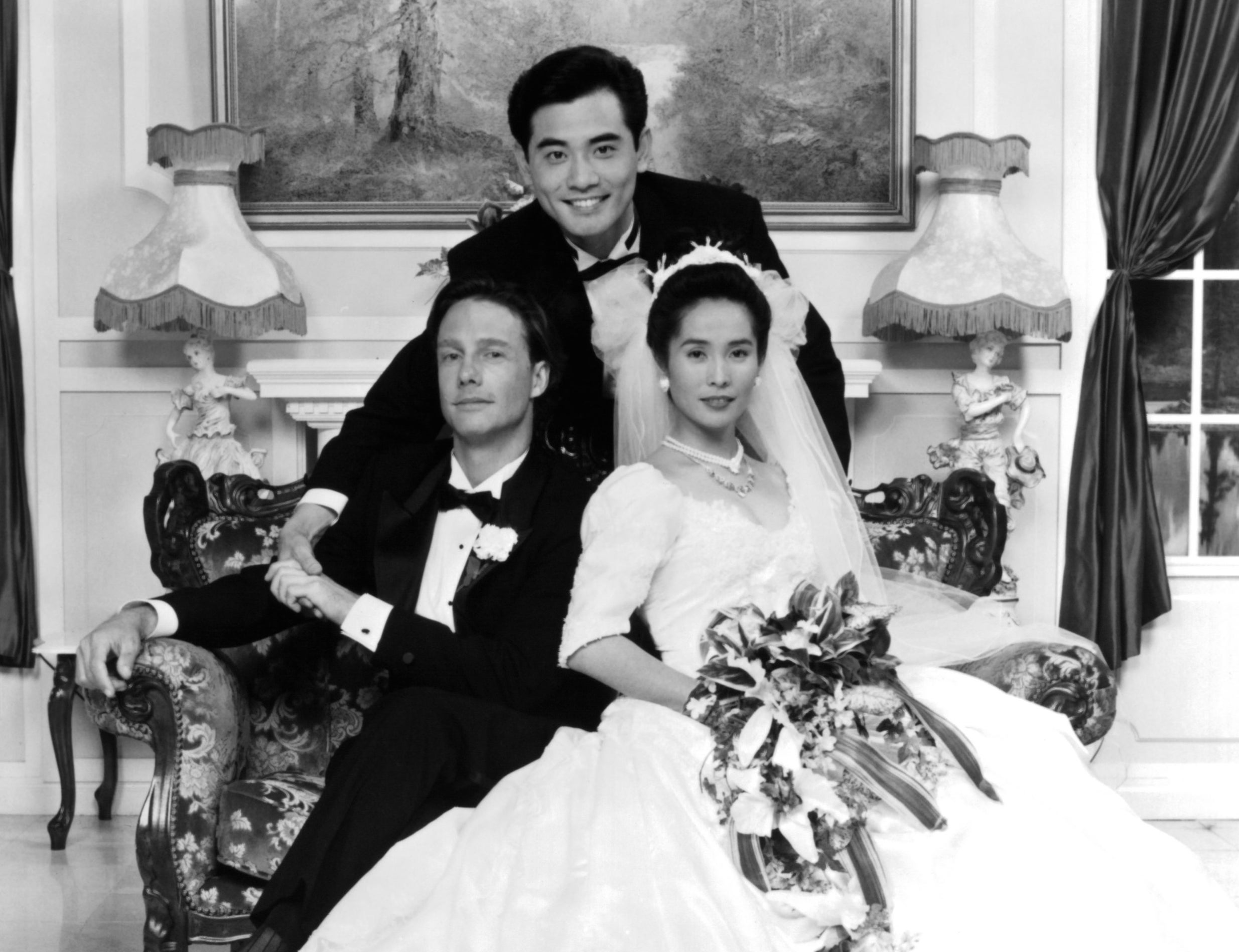 Actors Mitchell Lichtenstein, Winston Chao and May Chin appear in wedding attire for the poster for &quot;The Wedding Banquet.&quot;
